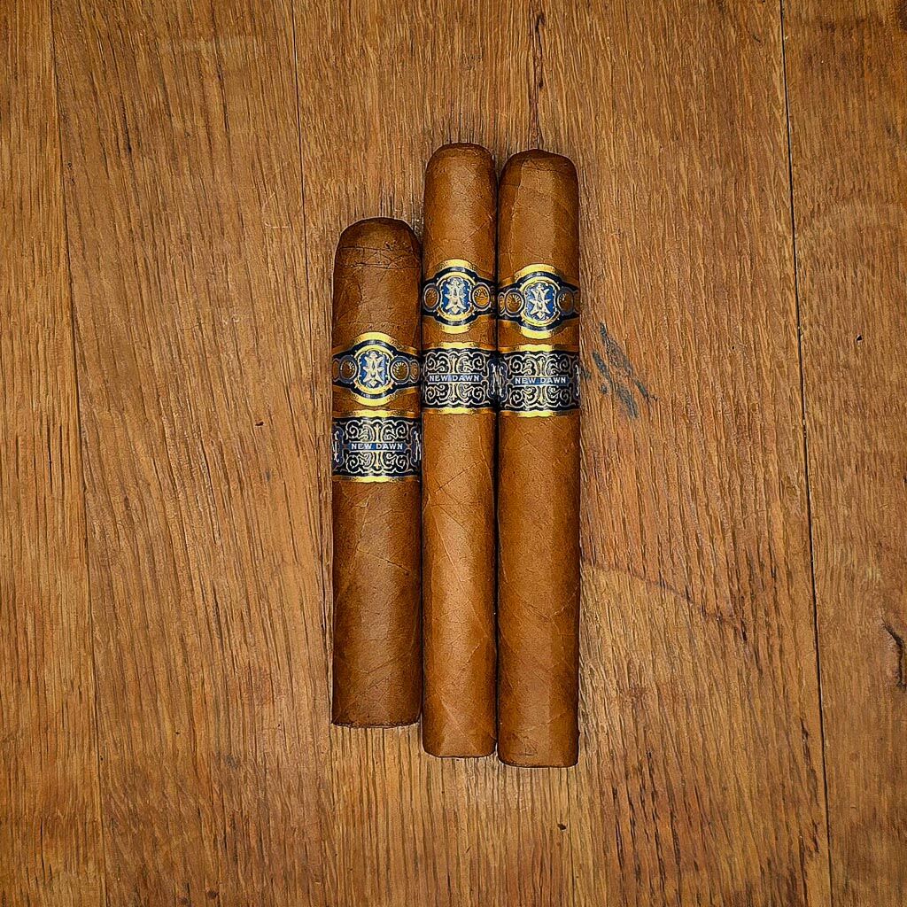 Avowed New Dawn cigars featuring Ecuadorian Connecticut wrapper on wood background