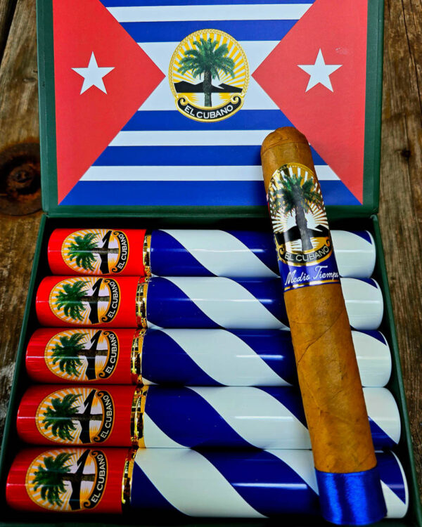 El Mago El Cubano out of the tube on top of a open box of cigars