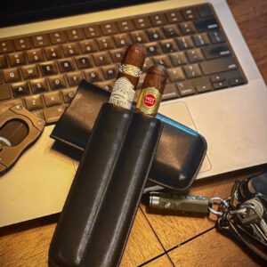Computer with keys and cutter. Visol leather cigar holder with two cigars