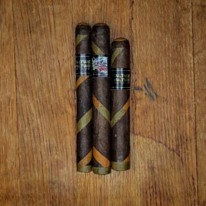 BLK WKS Culture Vulture cigars with graffiti-style bands and Ombré wrapper laid out on wood table at Smokers Abbey Austin